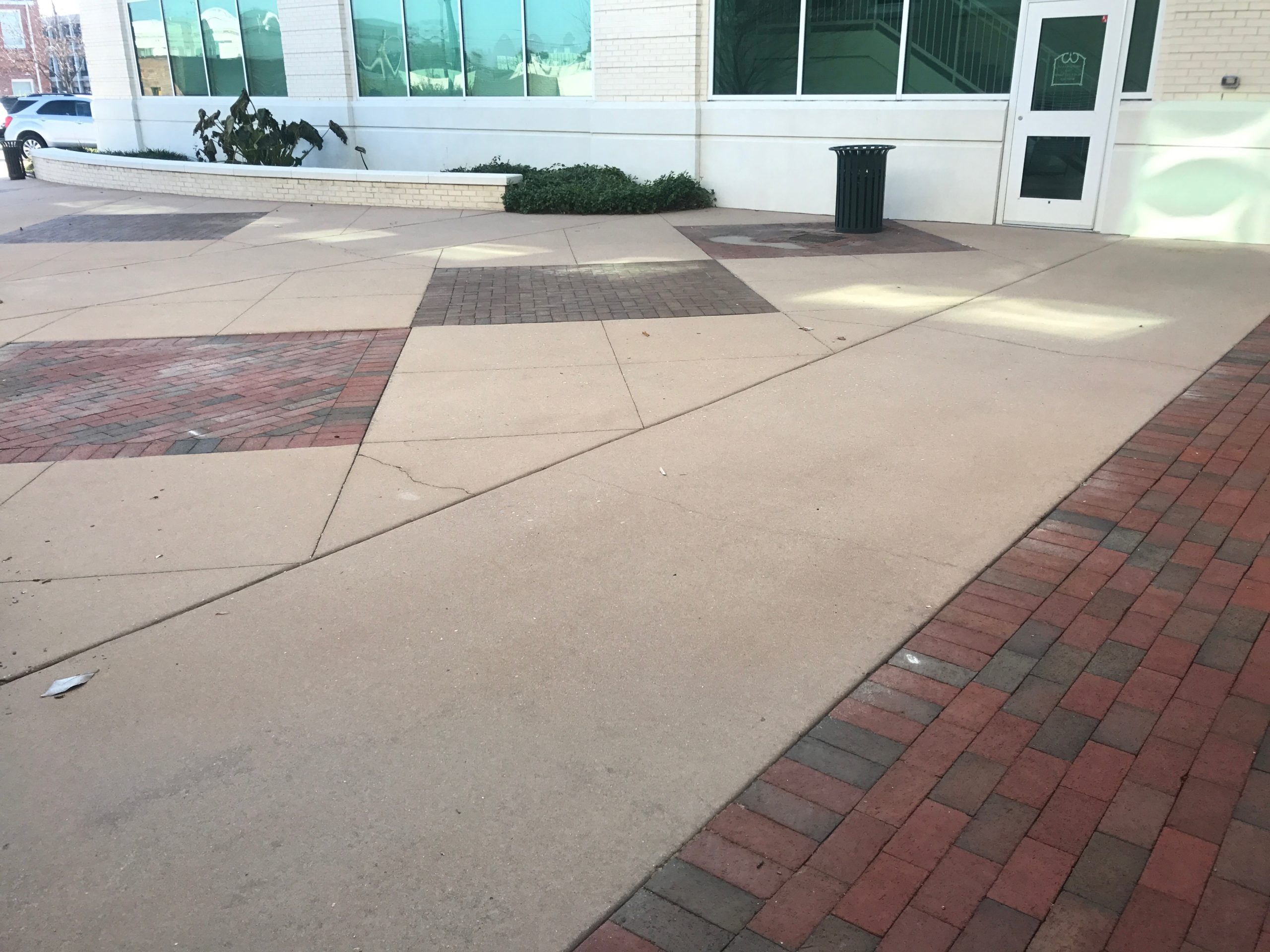 Clean concrete cleaning on a commercial building